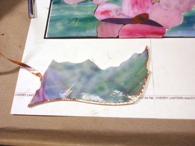 Copper Foiling pieces of glass for the Cherry Blossom andon
