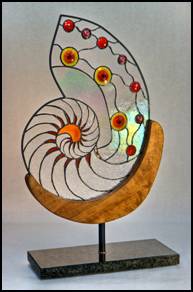 Poseidon's Chalice Free Standing Sculpture in Stained Glass.  Nautilus shell with Blenko rondels on marble stand